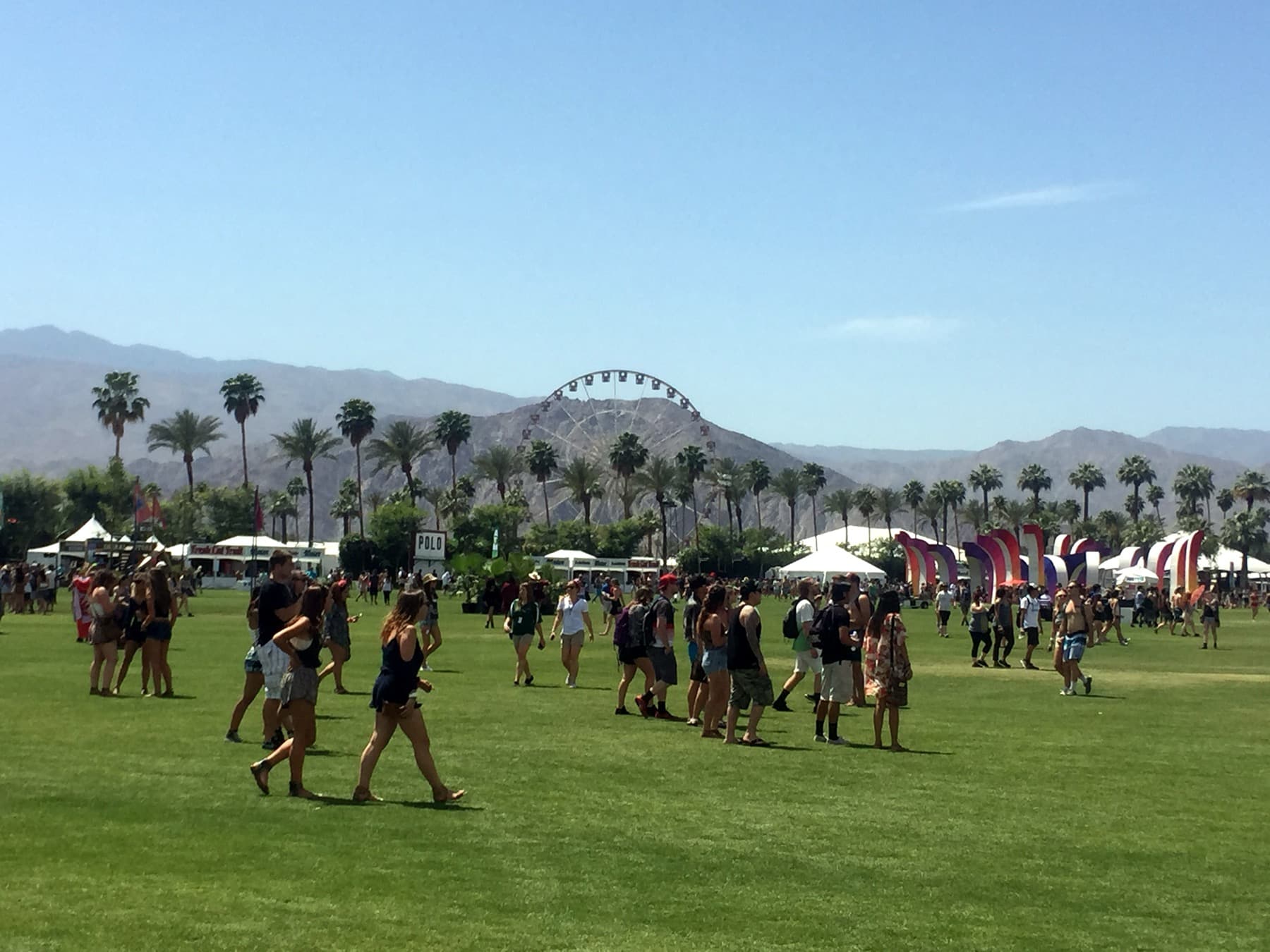 The polo field at the Coachella Valley Music and Arts Festival in April 2015, with the Ferris wheel in the background.